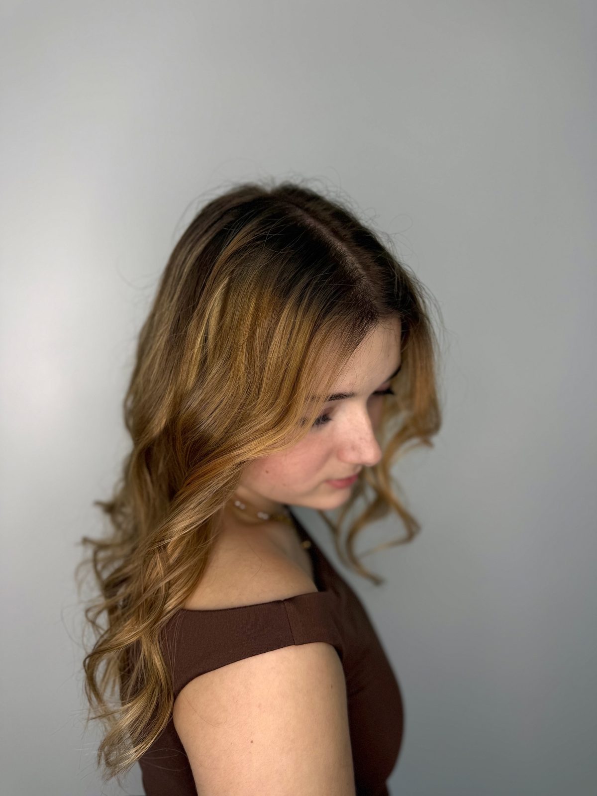 Balayage brun vers blond miel, ondulations
